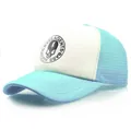 Sky blue and white trucker hat featuring a skull graphic and breathable mesh back - L / Sky Blue