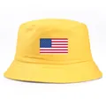 Bright yellow cotton bucket hat featuring a classic American flag patch on the front - One Size (58cm) / Yellow