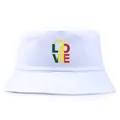White cotton bucket hat featuring colorful ONE LOVE print with Reggae style graphics - One Size / White