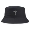 Fashionable black cotton bucket hat featuring a white Jesus cross print for outdoor sun protection - One Size (58cm) / Black