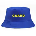 Royal blue bucket hat featuring yellow GUARD letter print and stitched brim for sun protection - One Size / Sapphire Blue