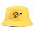 Bright yellow cotton bucket hat featuring a black carp fishing graphic and text print - Yellow