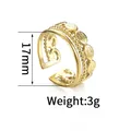 Detail view of gold geometric stacked rings showing 17mm inner diameter and 3g weight - Three-Layer Spliced Oval Style / Gold