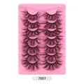 7 pairs of dense 3D curly black faux mink eyelashes on a pink wavy display tray - Messy Curled Style (7007)