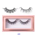 Crossed thick black false eyelashes with blue tips and pink glitter accents in a box - Black and Light Blue Style (LP21)