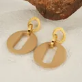 Boucles d'oreilles géométriques en acrylique et acier inoxydable doré avec anneaux ovales - Or
