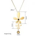 Collana in acciaio inossidabile placcata oro 14K con ciondoli a fiore e nappa a sfera - Stile Intarsio Nero Petalo Geometrico