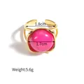 Detail view of gold ring with large 1.7cm rose pink stone and adjustable dual band - Round Red Stone Ring