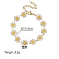 Daisy flower pearl bracelet in 18K gold plated finish featuring 15.5cm chain length - Daisy Shaped Link Bracelet (1091)
