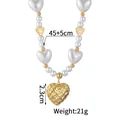 Detailed view of pearl heart necklace with hollow gold pendant and 45cm chain length - Heart Hollow Style (CXN2213-H)