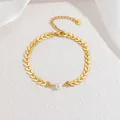 18k gold plated wheat ear chain bracelet featuring a round white pearl inlay - Single Pearl Leaf Chain Style (CX-B1287-B)
