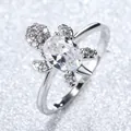 Macro detail of silver turtle ring with large oval white zircon and pave setting - US 8 / White Zirconia