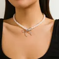 Elegant beaded pearl choker necklace featuring a central silver metallic bow pendant - Specification / Silver White (6243)