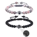 Macro detail of 100 languages projection stone on beaded stone couple bracelets - Pink Zebra Stone + Matte Stone