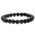 Detailed macro view showing the porous texture of 8mm natural black lava stone beads - Lava Stone