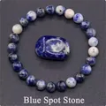 Natural blue spot stone beaded bracelet with matching raw stone on grey background - Blue Spot Stone