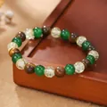 Pulsera de cuentas con ojo de tigre y ágata verde en un soporte de madera café - Estilo Craquelado Ojo de Tigre Tricolor (ZJ14021)