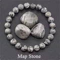 Map Stone beaded bracelet featuring natural grey marble patterns and raw mineral stones - Map Stone