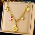 Golden chunky chain necklace featuring colorful dolphin, starfish, and seashell pendants - Dolphin Starfish Heart Gemstone Style (N3131)