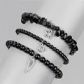 Detail of three-piece black crystal stretch bracelets with star moon and feather charms - Black (FK1307-19CM)