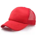 Adjustable bright red trucker hat with a breathable mesh back and a curved brim style - Red