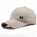 Beige baseball cap with metallic M letter logo and classic curved brim for sun protection - Adjustable / Khaki