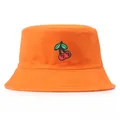 Bright orange cotton bucket hat with cherry embroidery design on a white background - One Size (56-58cm) / Orange