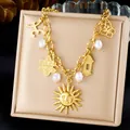 Detailed view of Puerto Rican themed gold charm bracelet with Coquí frog and pearls - 18K Vacuum Gold Plated Ocean (N3455)