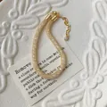 S925 sterling silver mesh bracelet in gold finish with sparkling crystals and lobster clasp - 925 Silver / Gold