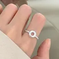 Minimalistischer S925 Sterlingsilber Ring mit gedrehtem Band und Donut-Motiv - Donut