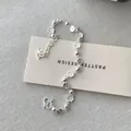 Bracelet en argent sterling S925 avec fleurs de cerisier et pendentif papillon - Argent 925 / Argent