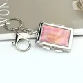 Macro view of silver rectangular keychain with pink marble texture and lobster clasp - Rectangle Pink Marble (With Lobster Clasp)