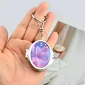 Mini metal oval locket keychain with purple butterfly pattern and flip-open mirror - Oval Purple Butterfly
