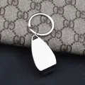 Polished silver metal bottle opener keychain with smooth water-drop shaped pendant - Silver Smooth Style (GX-060)