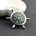 Creative nautical helm keychain with functional compass on dark textured background - Ship Wheel Compass Style / Silver