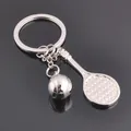 Polished silver metal tennis racket and ball keychain pendant with reflective surface - Tennis Racket Style (GX-297)