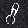 Macro detail of silver alloy car keychain with black lychee leather and dual metal rings - Polished Alloy Double Layer Clip Style (GX-381)