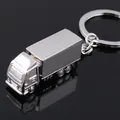 Polished silver metal semi-truck keychain with container trailer on a reflective surface - Solid Truck Style (GX-034) / Silver - Solid Style
