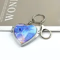 Silver heart-shaped mirror keychain with a vivid blue butterfly design on the front cover - Heart Blue Butterfly (With Lobster Clasp)