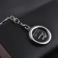 Polished silver metal mini photo frame keychain with secure lobster clasp and ring - Round Frame Style