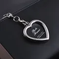 Polished silver heart-shaped photo frame keychain with metallic mirror finish - Heart Frame Style