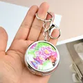 Porte-clés pilulier rond en métal avec motif pivoine violette et papillon - Style Pivoine Avec Porte-clés et Fermoir Mousqueton