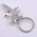 Polished silver metal spray gun keychain with a creative industrial tool model design - Silver