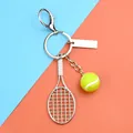 Portachiavi con racchetta da tennis e pallina gialla fluo con targhetta in metallo - Racchetta Tennis Palla Targhetta Vuota E Moschettone