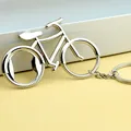 Portachiavi bici argento con apribottiglie in metallo lucido e anello piatto - Apribottiglie Bicicletta / Argento
