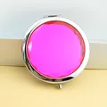 Portable round silver makeup mirror featuring a large multifaceted pink gemstone on top - Hot Pink
