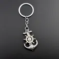 Vintage rotating anchor and ship wheel keychain in polished silver metal finish - No Tag Style / Nickel Color