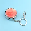 Mini boîte à pilules argentée avec incrustation de marbre orange et porte-clés - Pilulier Rond + Porte-clés + Fermoir Mousqueton / Or Rose Fluide