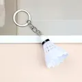 Macro shot of realistic white badminton shuttlecock keychain with silver metal ring - White Style (A-006)