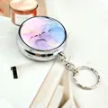 Close-up of portable metal box with keychain featuring blue marble art pattern - Keychain style / Pink Purple Marble (Aegean)